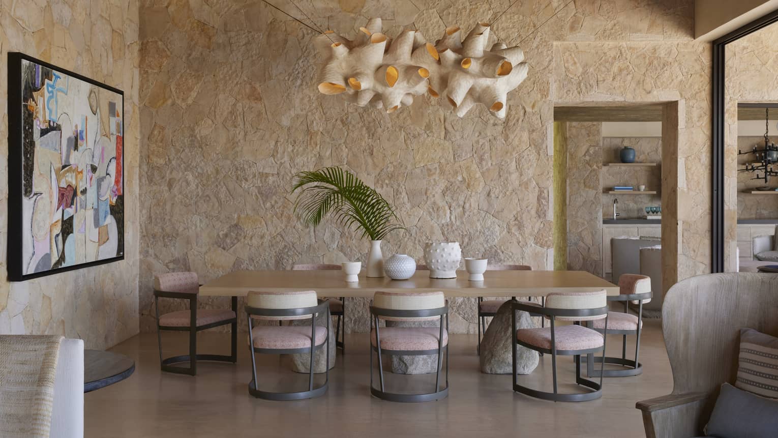 Dining room with rustic stone walls