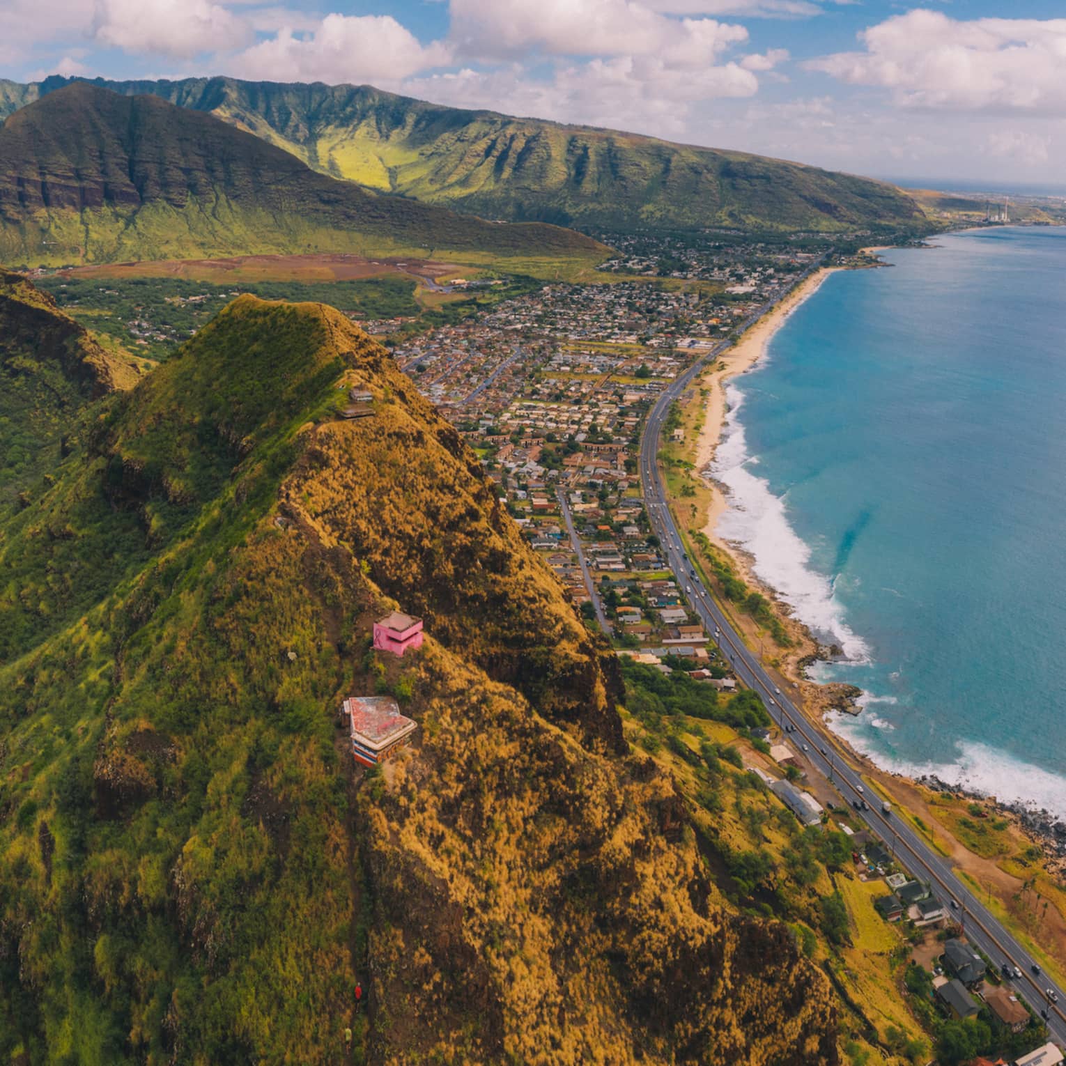 Aerial view of Hawaiian coastline and trail for the Ma'ili Pillbox Hike