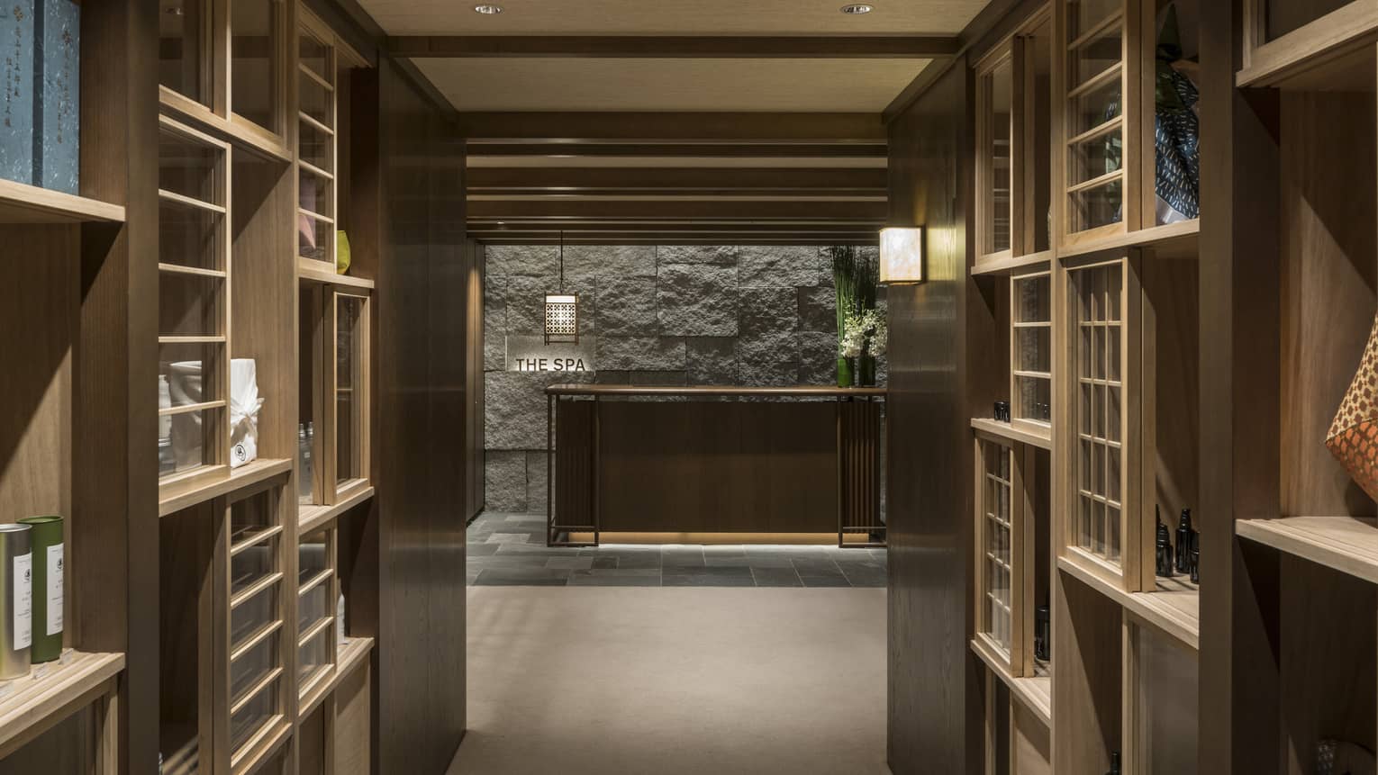 Tranquil entryway to the Kyoto hotel spa at Four Seasons Hotel Kyoto with refined wooden interiors and calm ambiance.