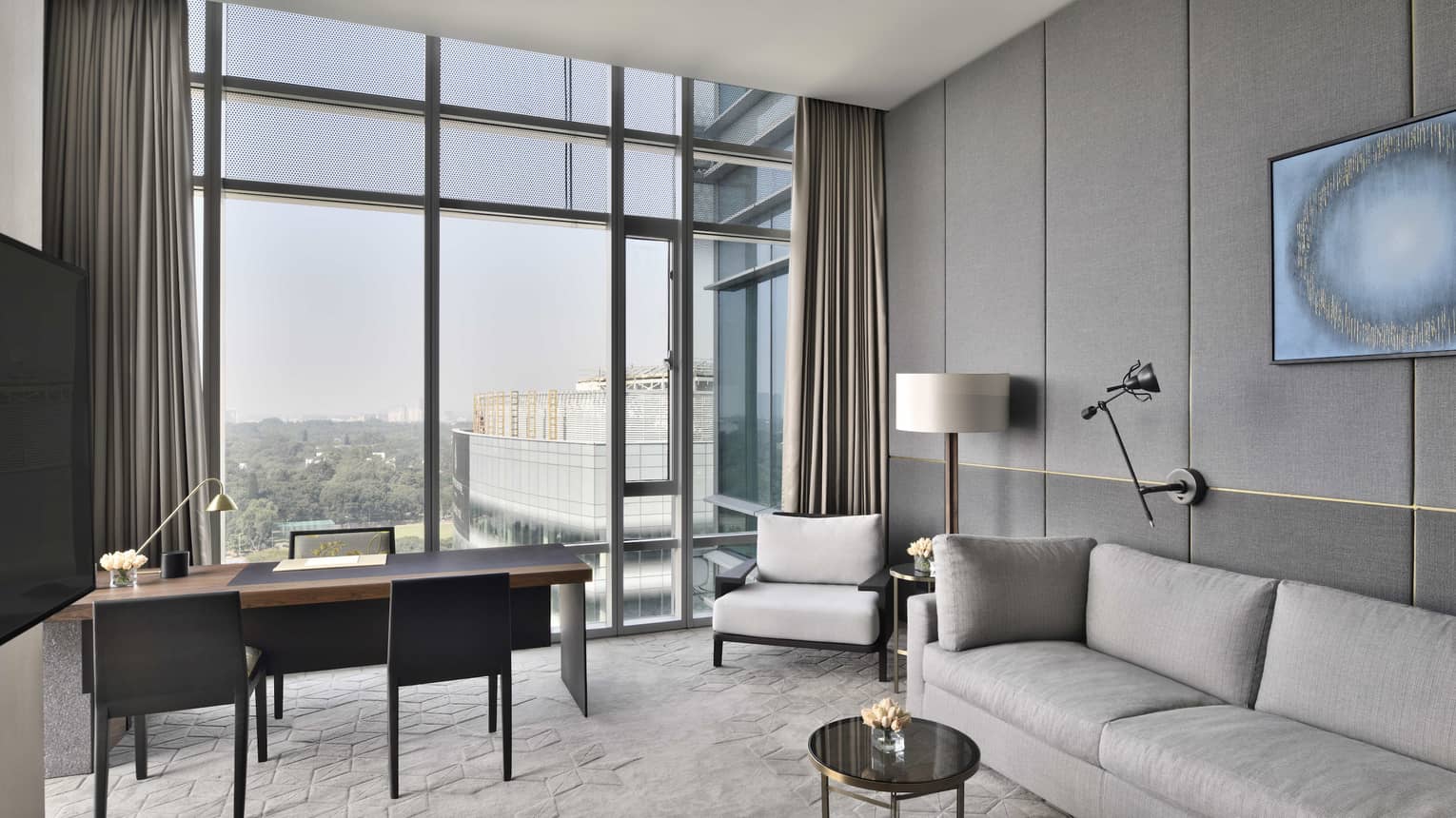 Sitting area with sofa and desk