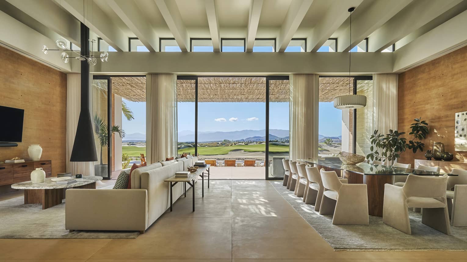 Luxury villa with expansive great room, opening to a sunset-view terrace, at Four Seasons Resort and Residences Los Cabos