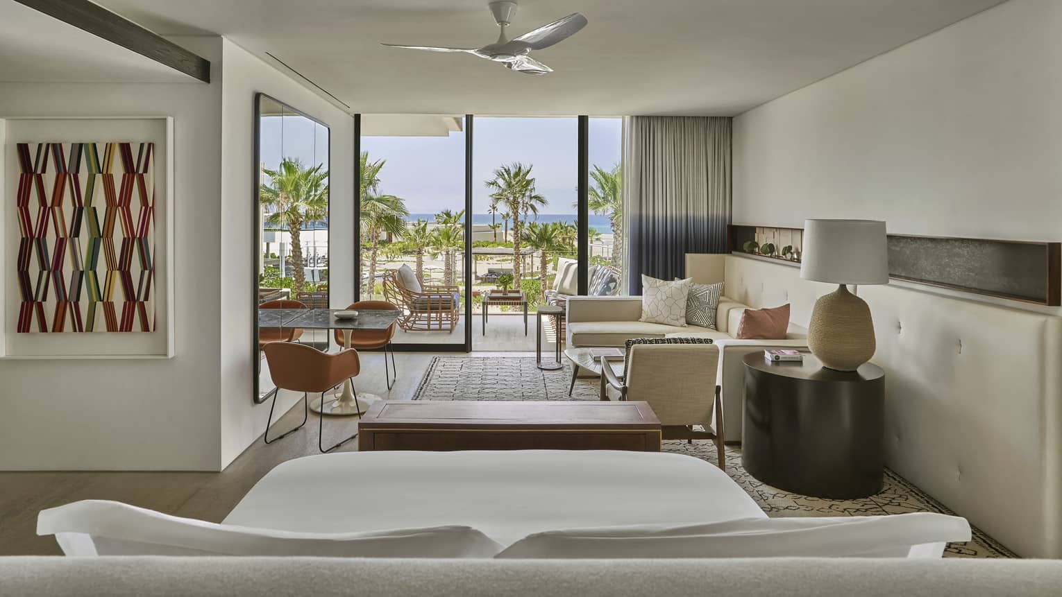 View of bedroom from the back of the bed's point of view, with walk-out balcony