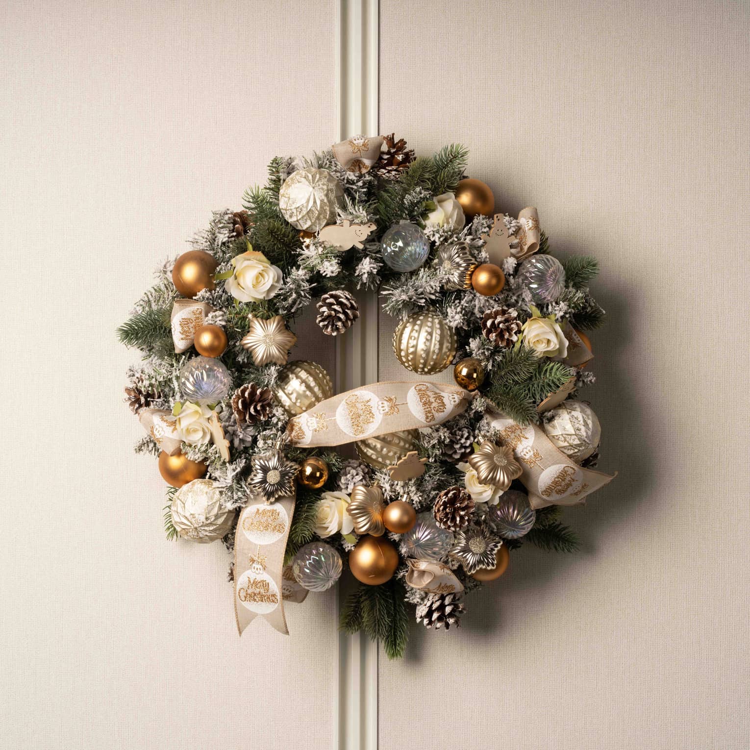 Christmas wreath with gold and white decorations