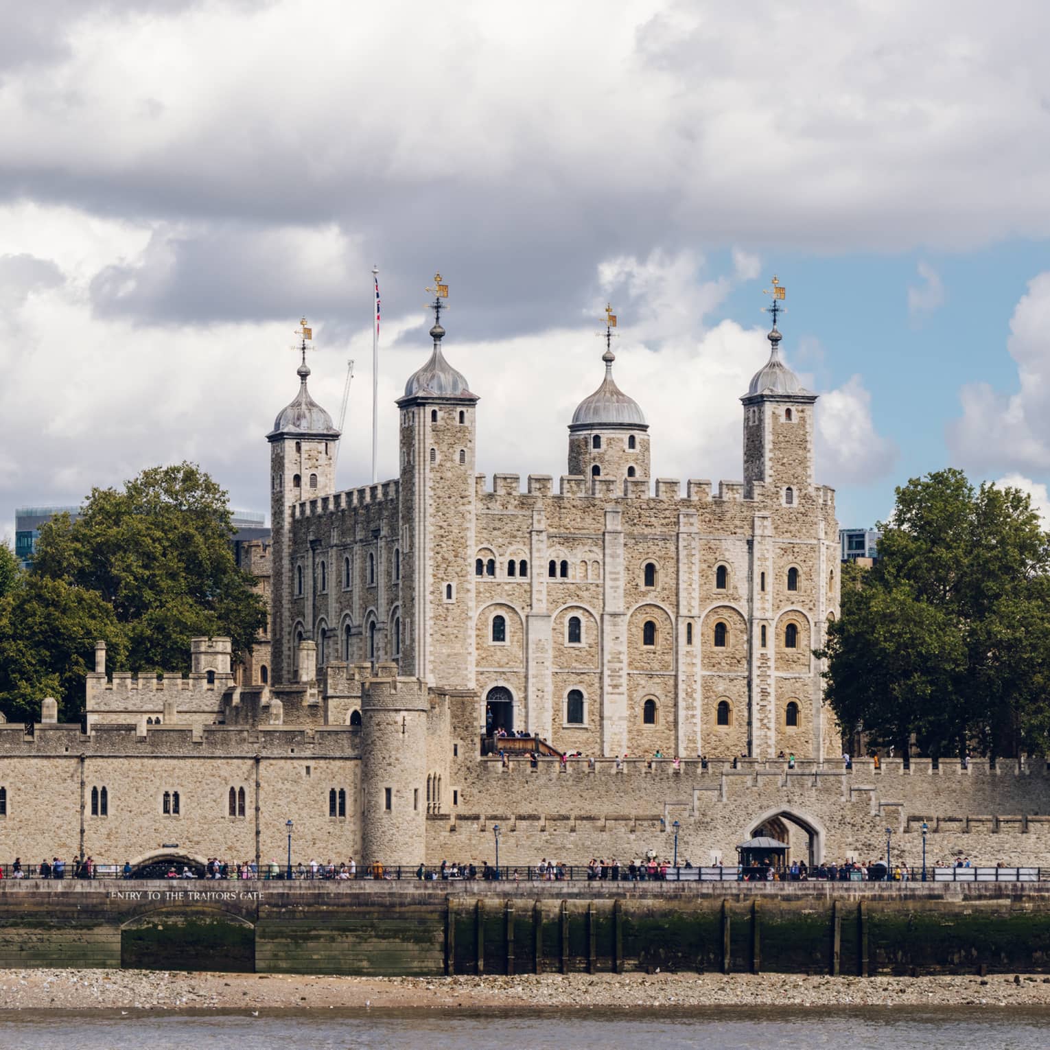 Tower of London under sky dappled with clouds