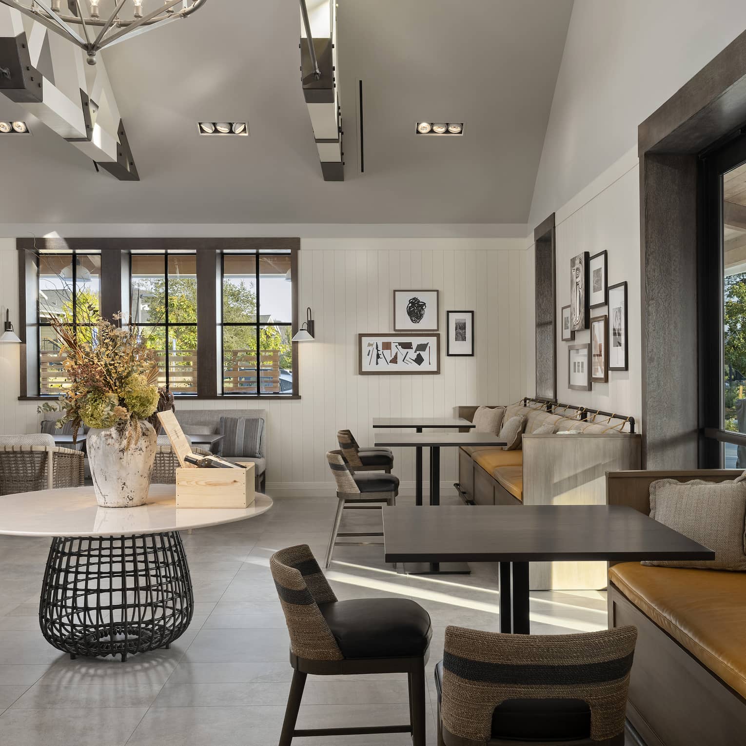 A large room with many seats and an eclectic style.