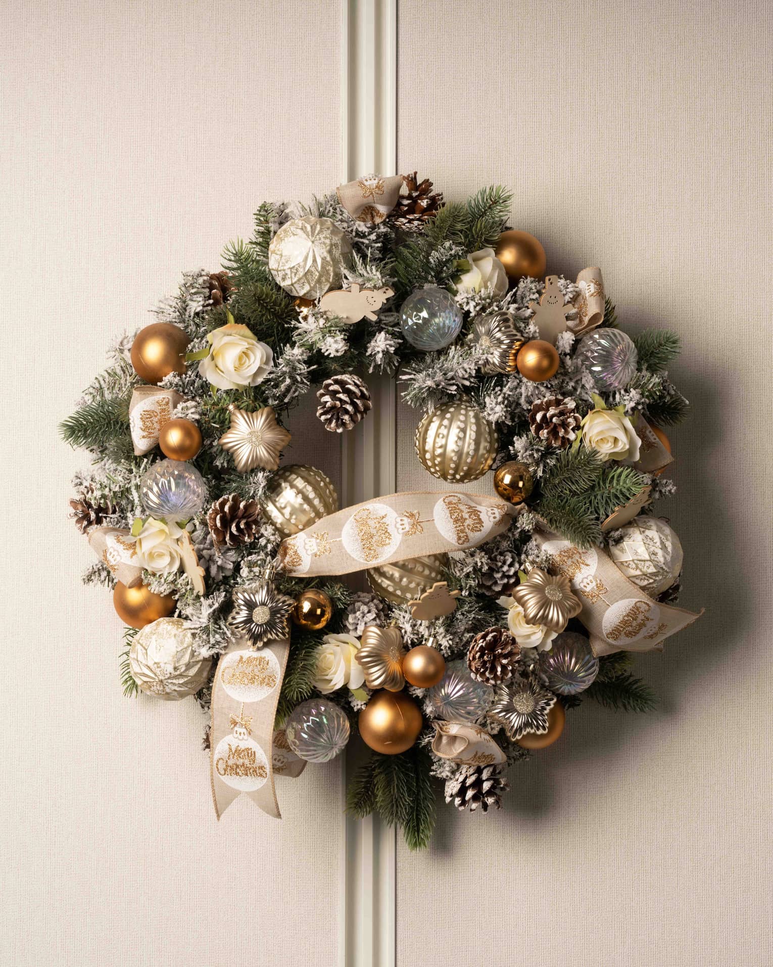 Christmas wreath with gold and white decorations