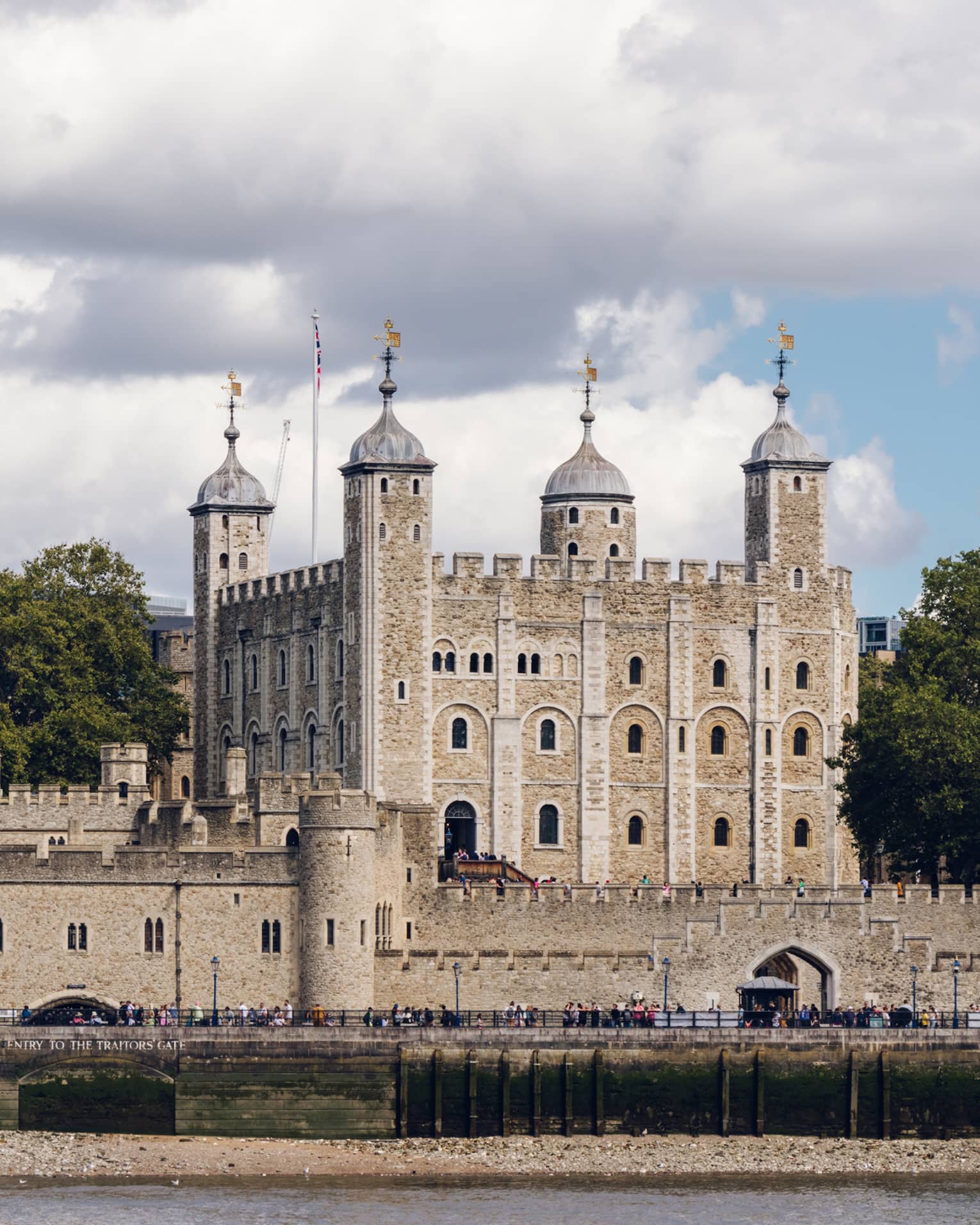 Tower of London under sky dappled with clouds