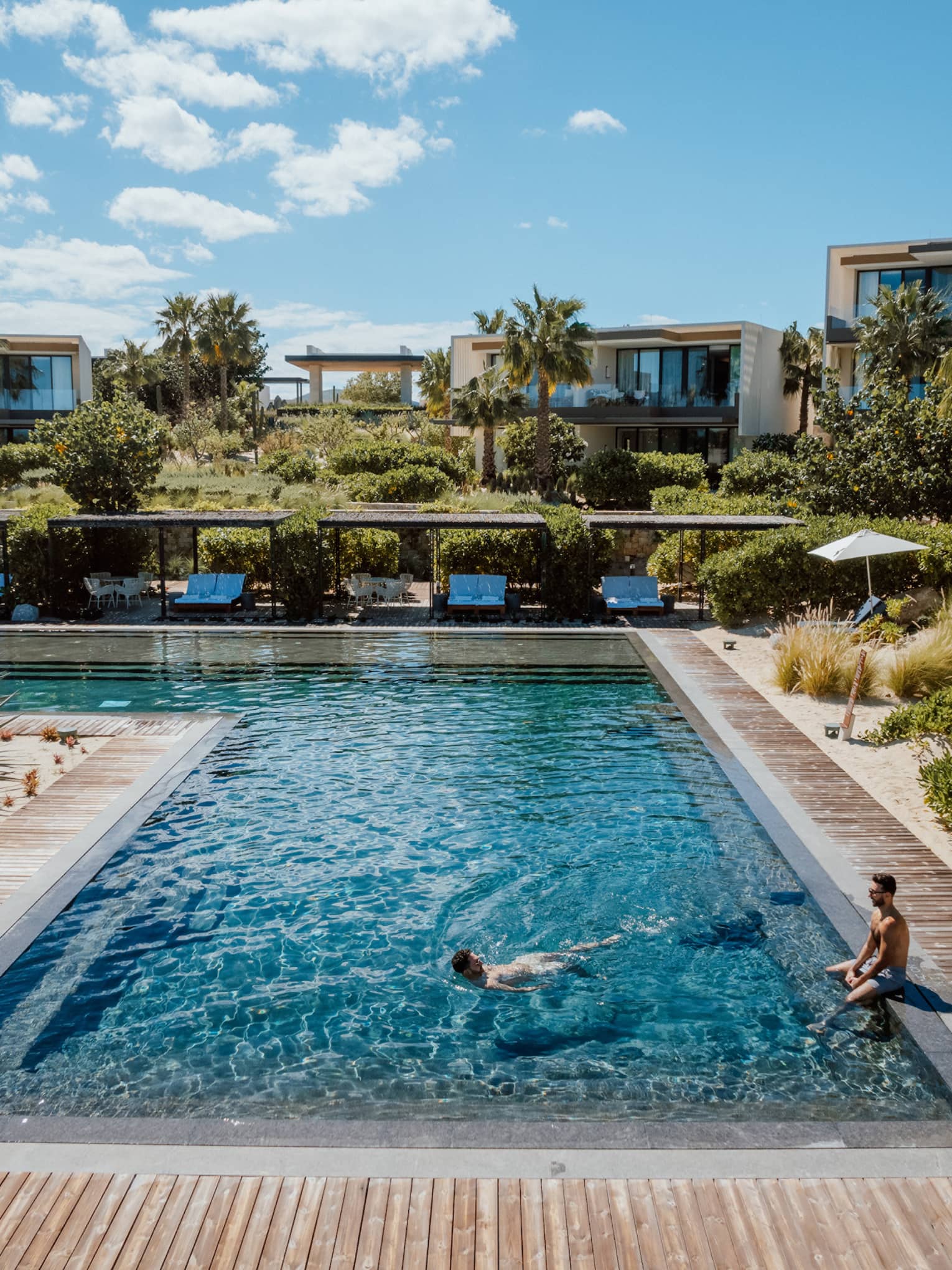 L-shaped resort pool in tropical location