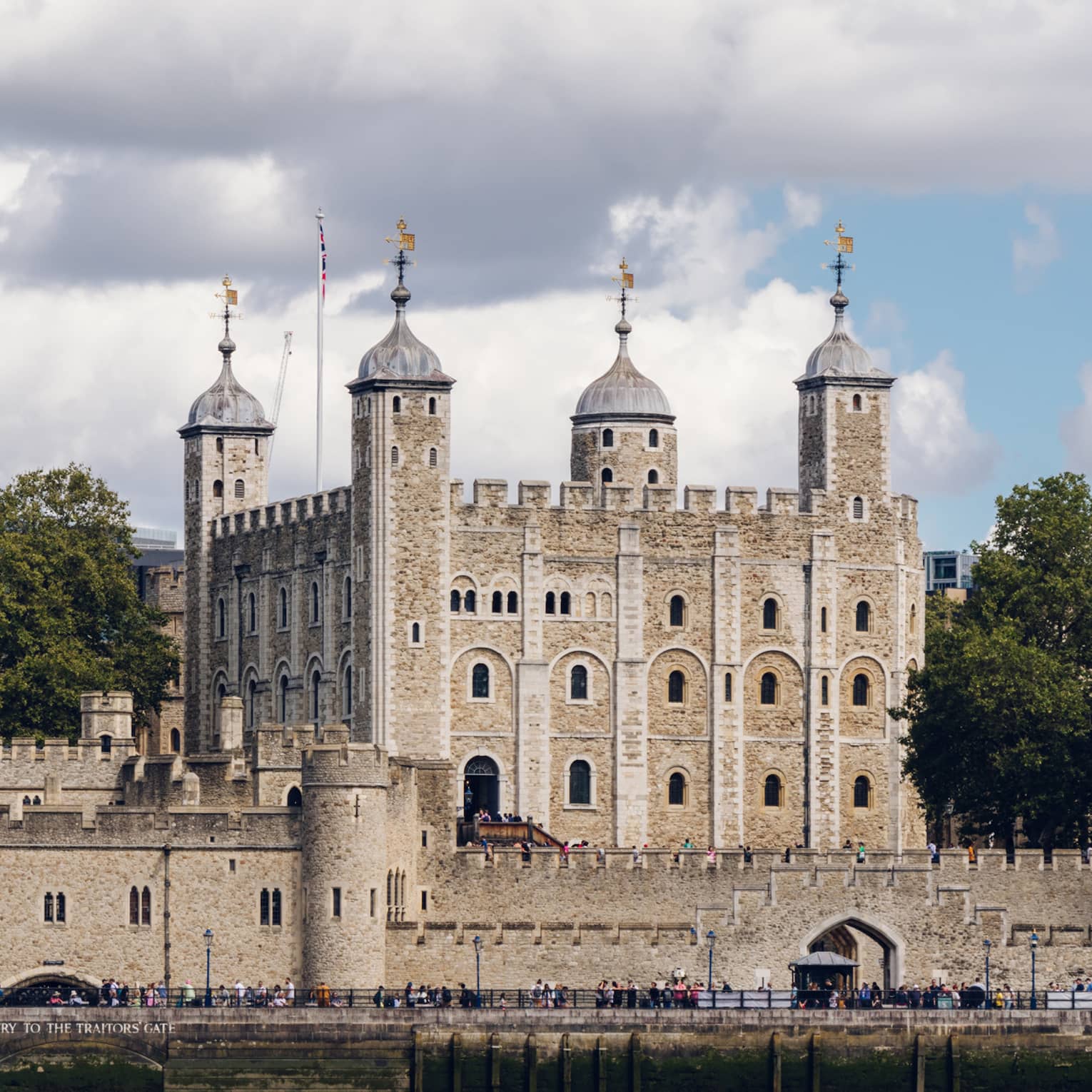 Tower of London under sky dappled with clouds