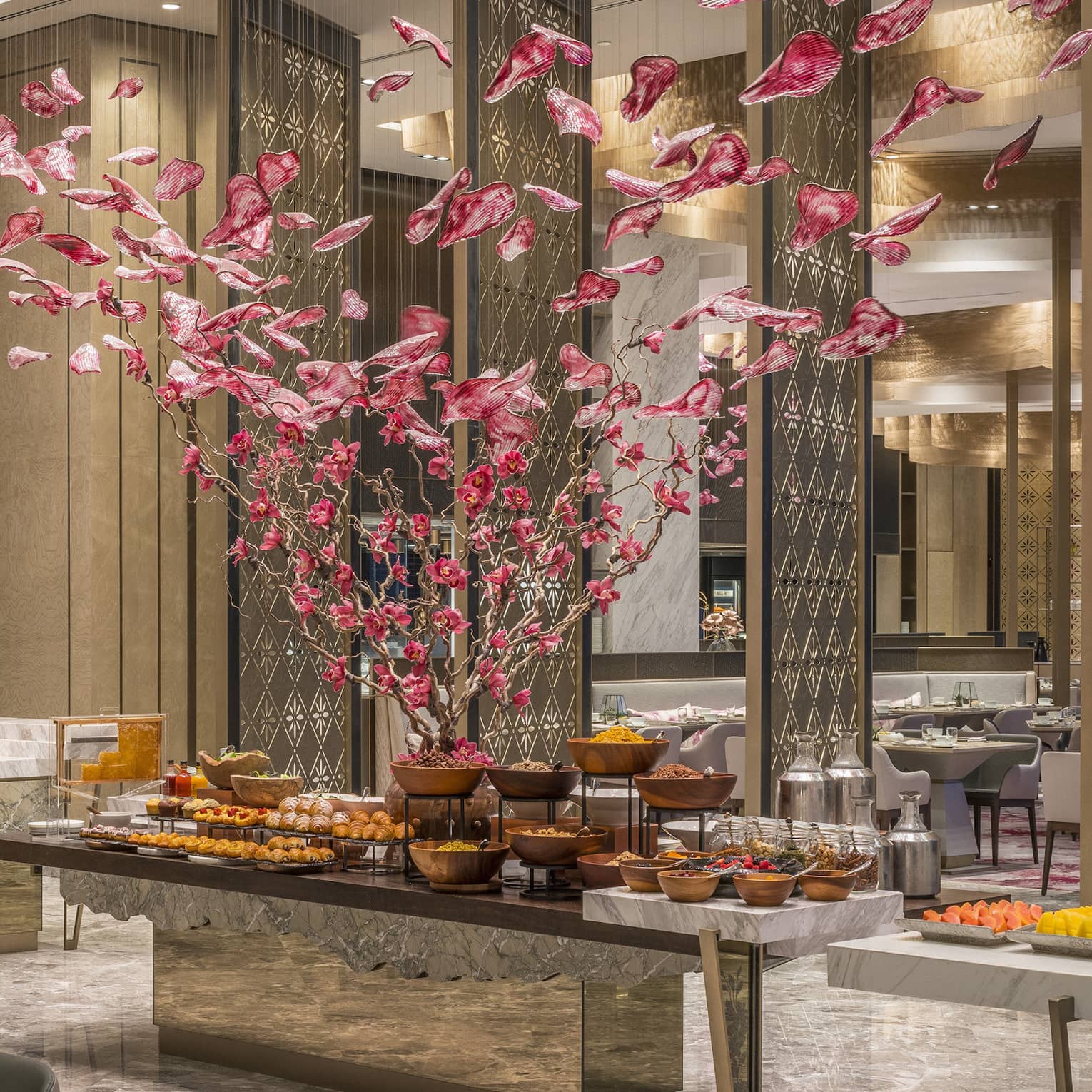 Curate buffet with floral arrangement