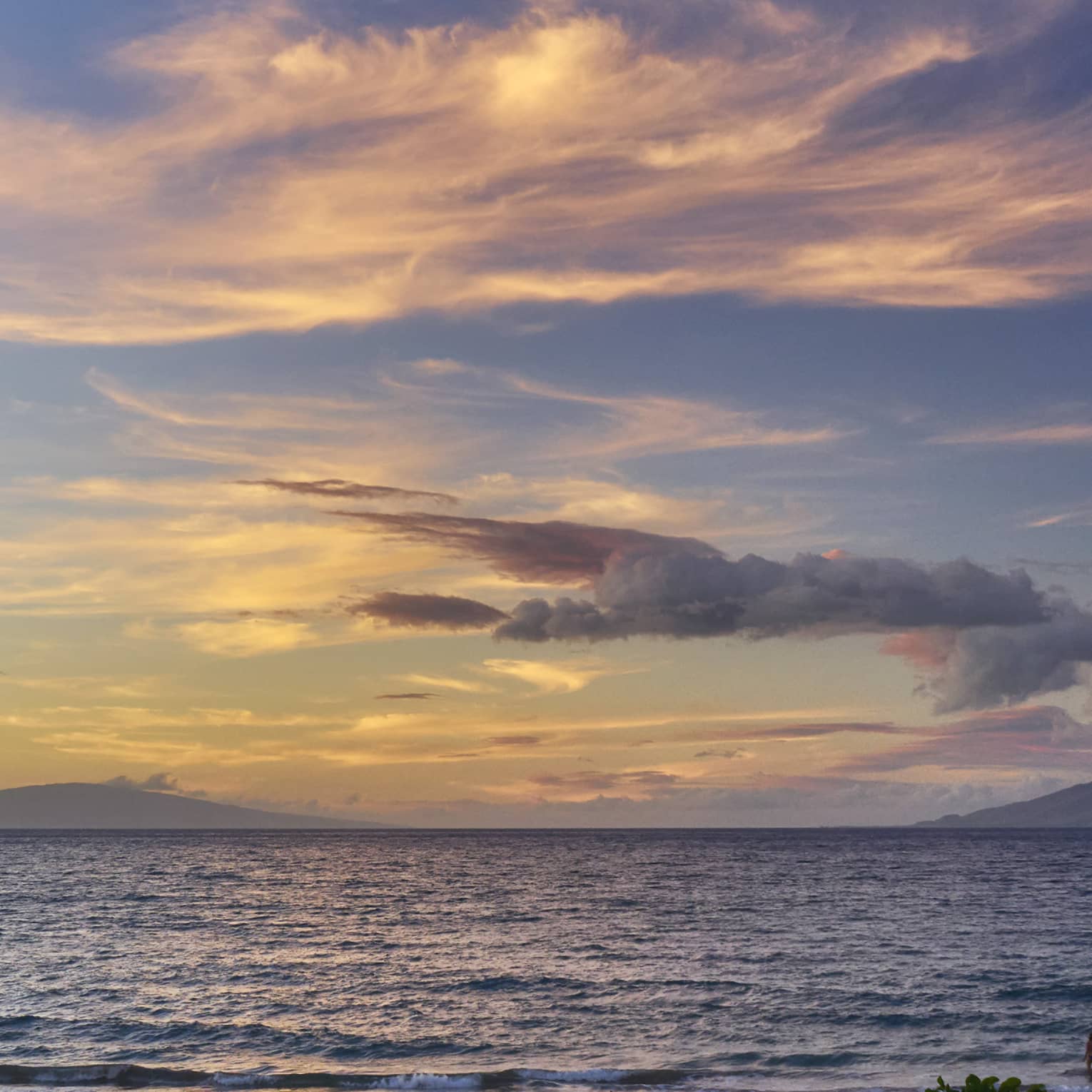 Sunset and clouds over Pacific ocean
