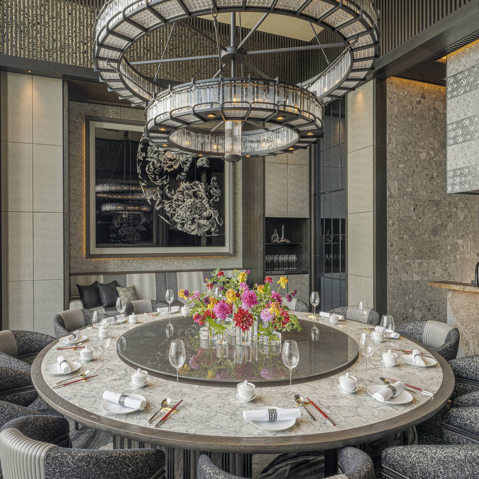A large, round dining table at Jiang Nan Chun restaurant at Four Seasons Hotel Osaka