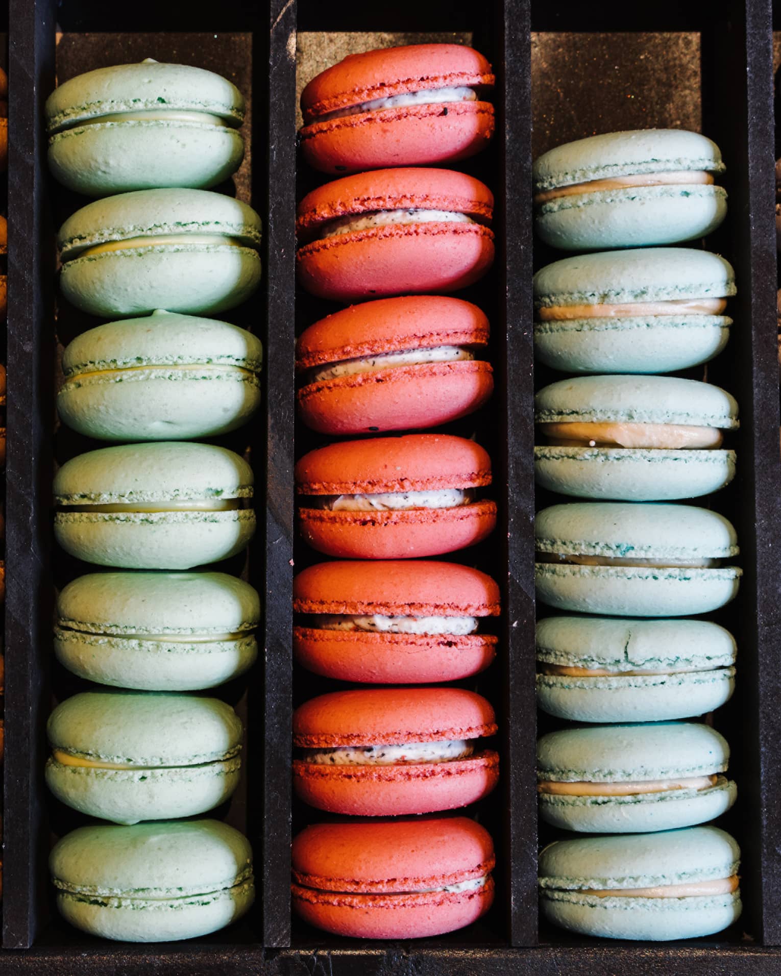 Rows of colourful macaron desserts