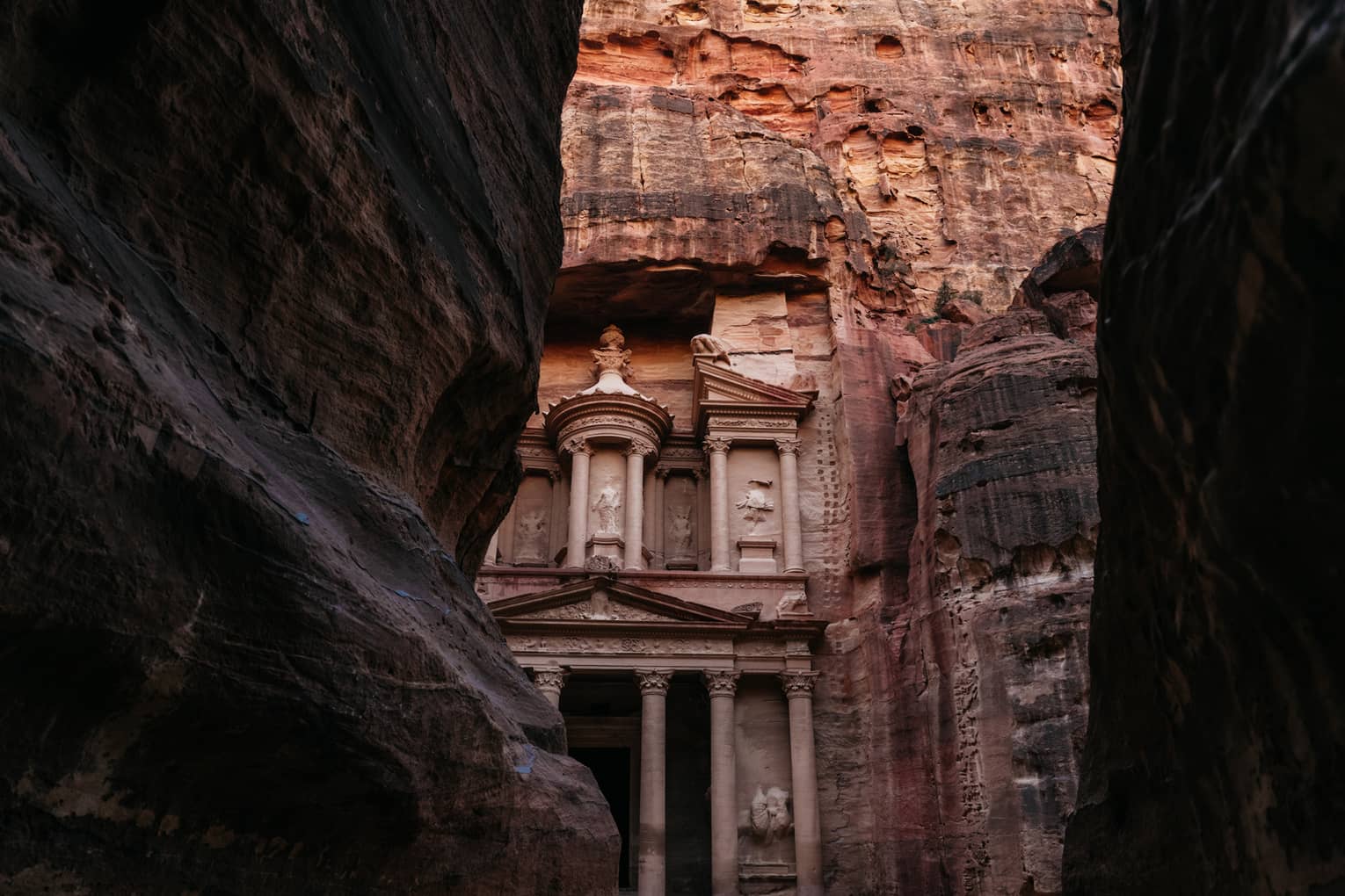 A sandstone cathedral carved in a mountain