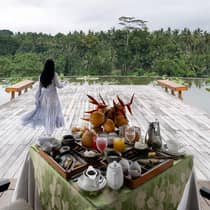 Woman on decking overlooking Ayung River Valley