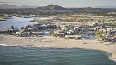 Aerial view of a beachside resort in Los Cabos