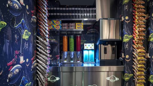A colourful pantry of snacks and drinks.