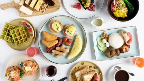 Breakfast spread at Curate including French toast, eggs royale, Nasi Lemak and other traditional dishes