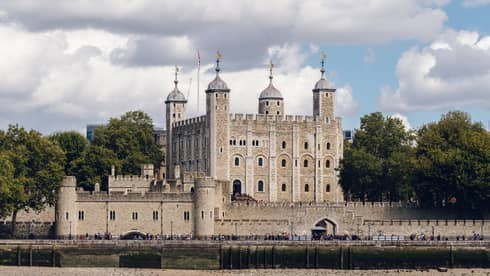 Tower of London under sky dappled with clouds