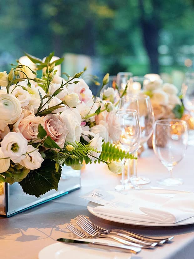 Floral arrangement on elegant table in luxury event venue Boston