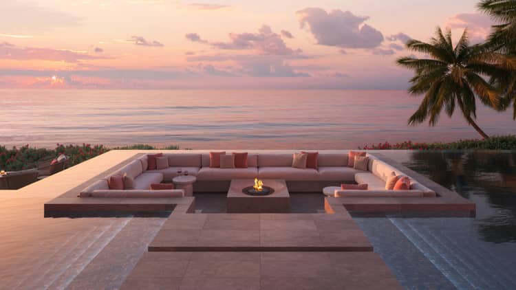 Rendering of outdoor firepit and couches by the oceanside